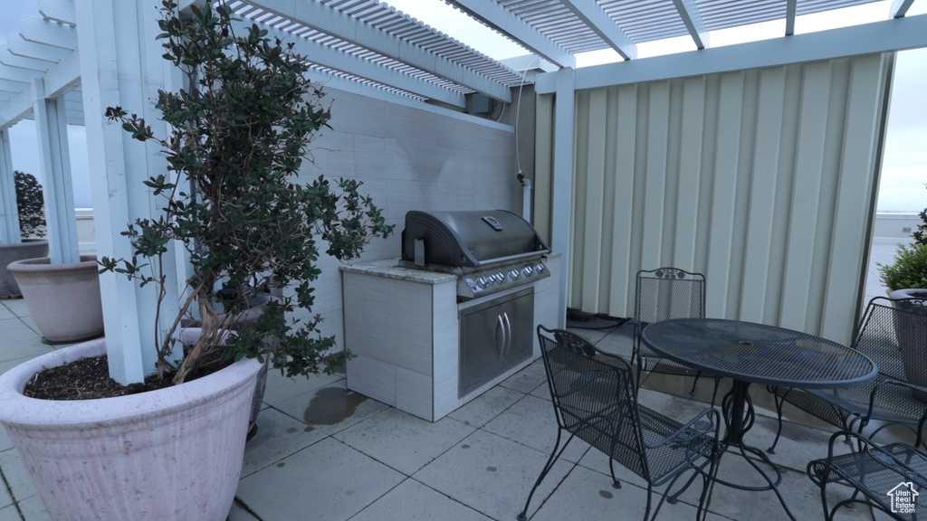 View of patio / terrace featuring a pergola and grilling area