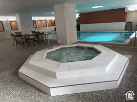 View of pool featuring an indoor hot tub