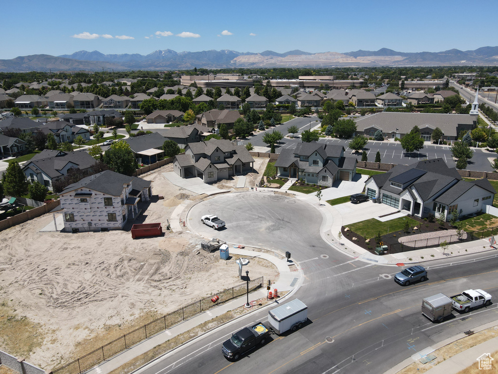 Birds eye view of property with a mountain view