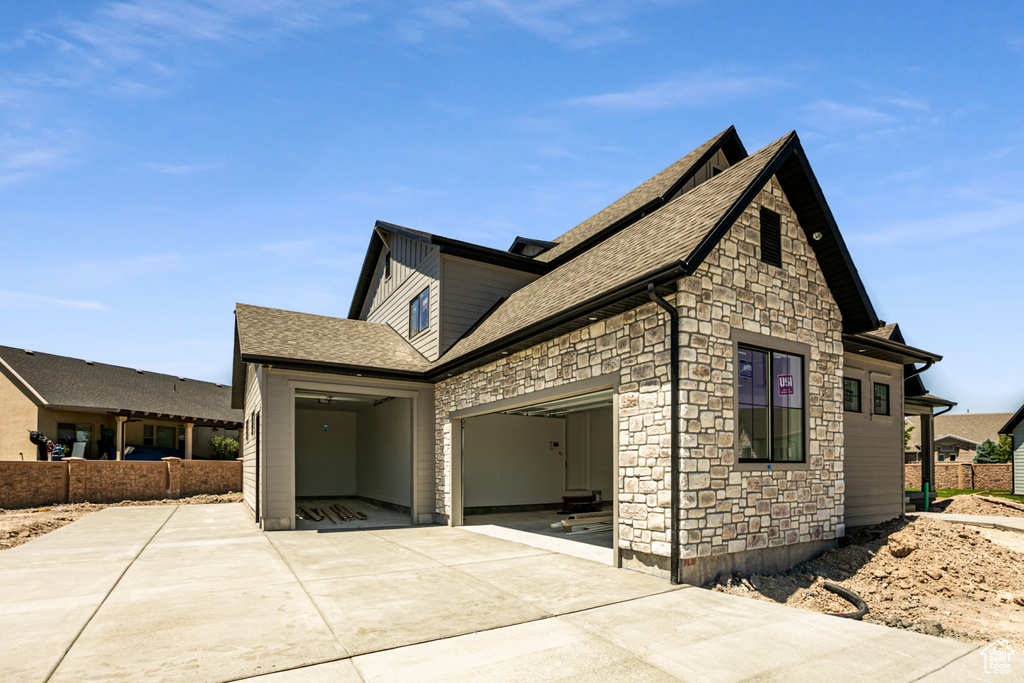 View of side of property featuring a patio