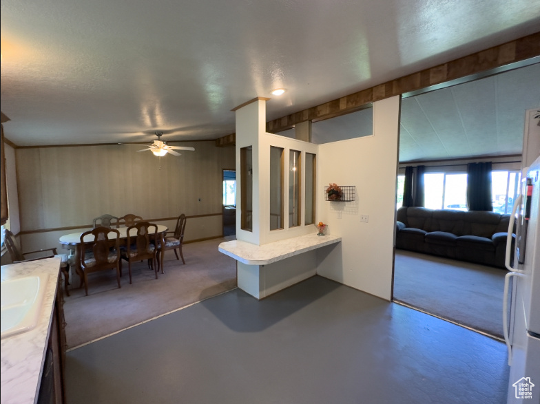 Bathroom with concrete floors and ceiling fan