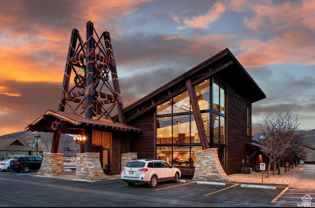 Outdoor building at dusk with central AC