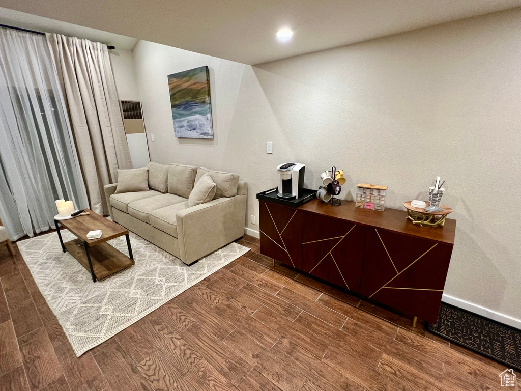 Living room featuring hardwood / wood-style flooring