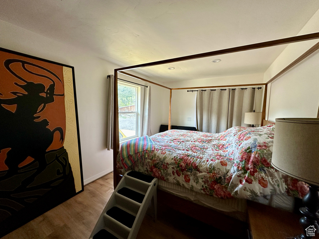 Bedroom featuring hardwood / wood-style floors