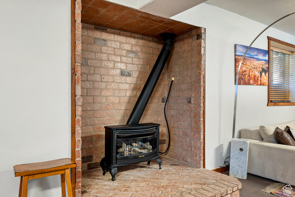 Room details with a wood stove