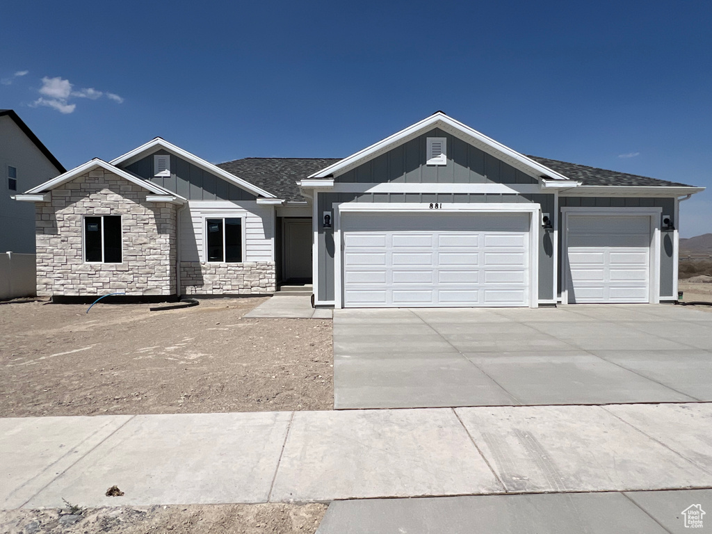 View of front of home featuring a garage