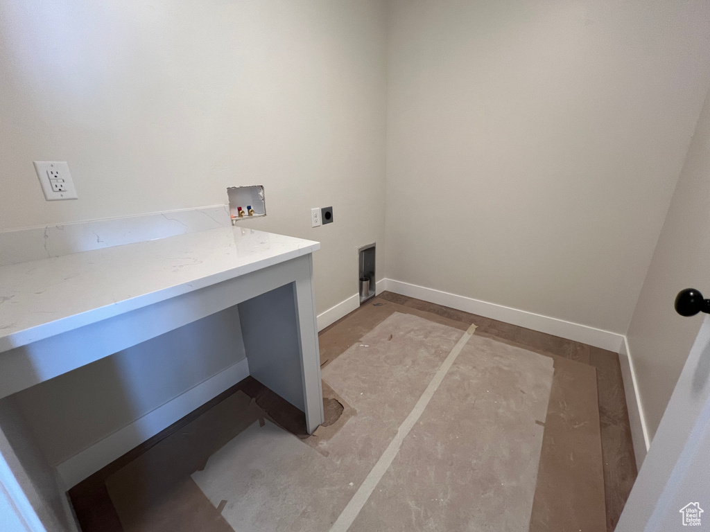 Laundry room with hookup for a washing machine and hookup for an electric dryer