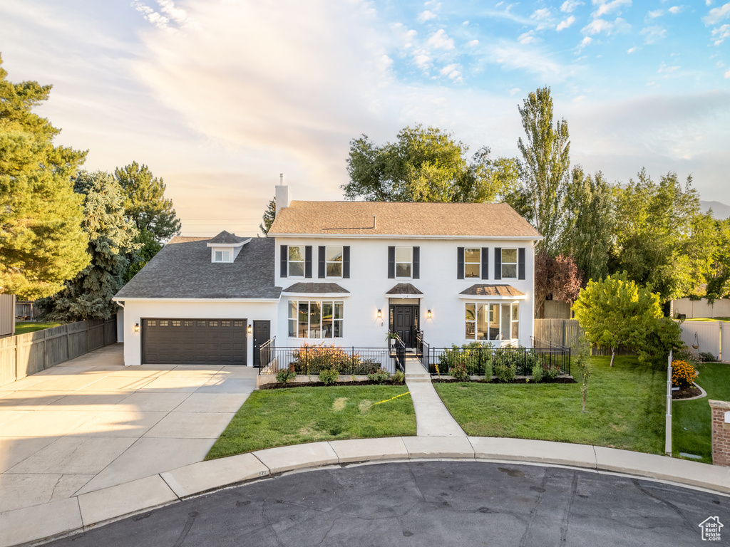 View of front of house with a lawn