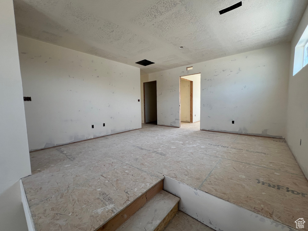 Spare room featuring a textured ceiling