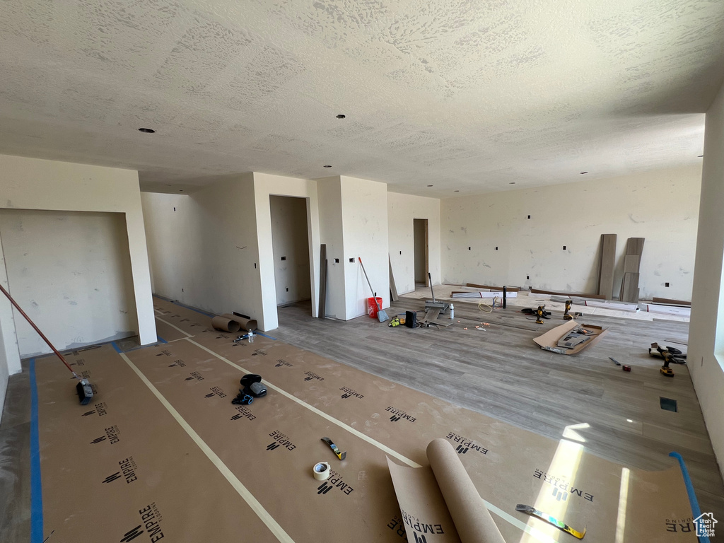 Interior space featuring a textured ceiling