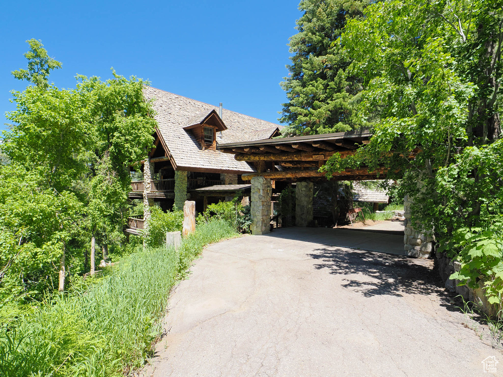 View of front of house featuring a carport