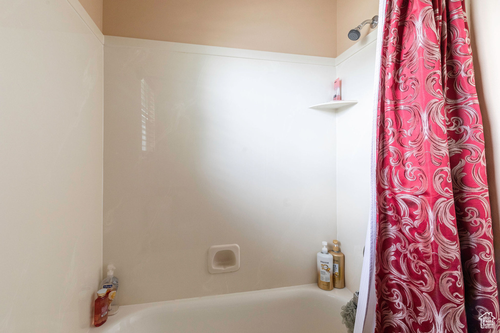 Bathroom featuring shower / tub combo