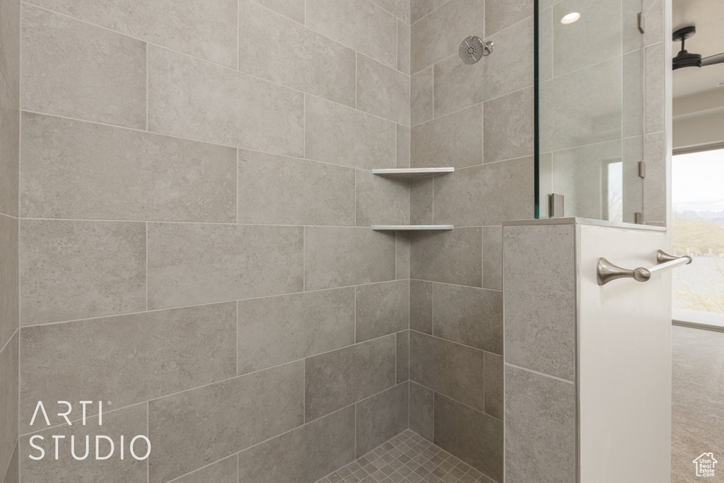 Bathroom with tiled shower