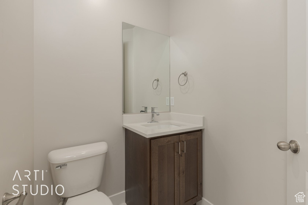 Bathroom featuring toilet and vanity