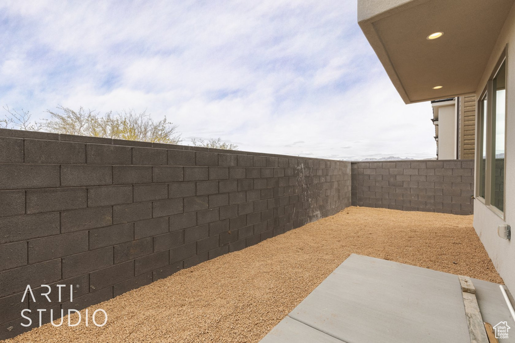 View of yard with a patio area