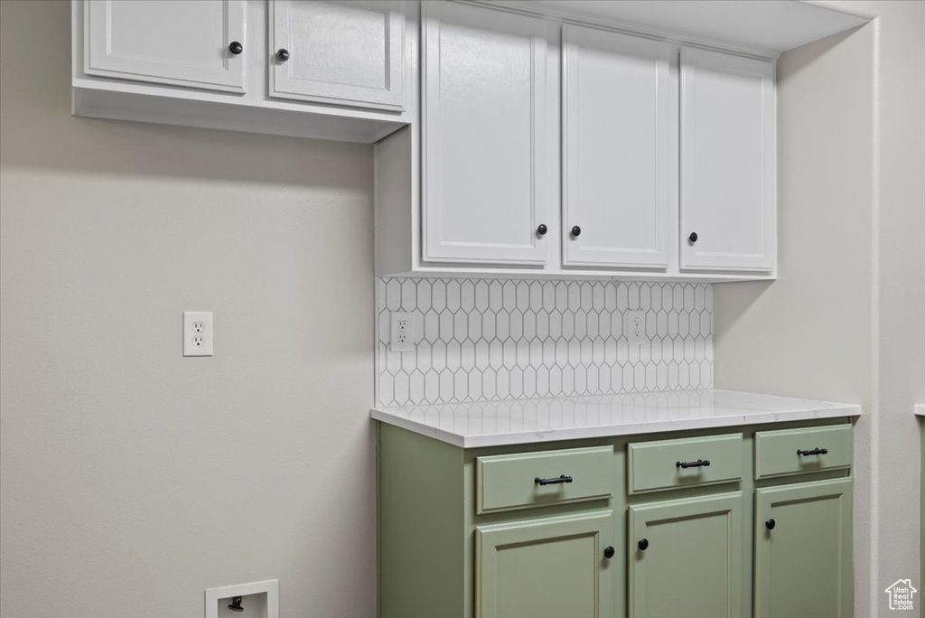 Kitchen with green cabinets