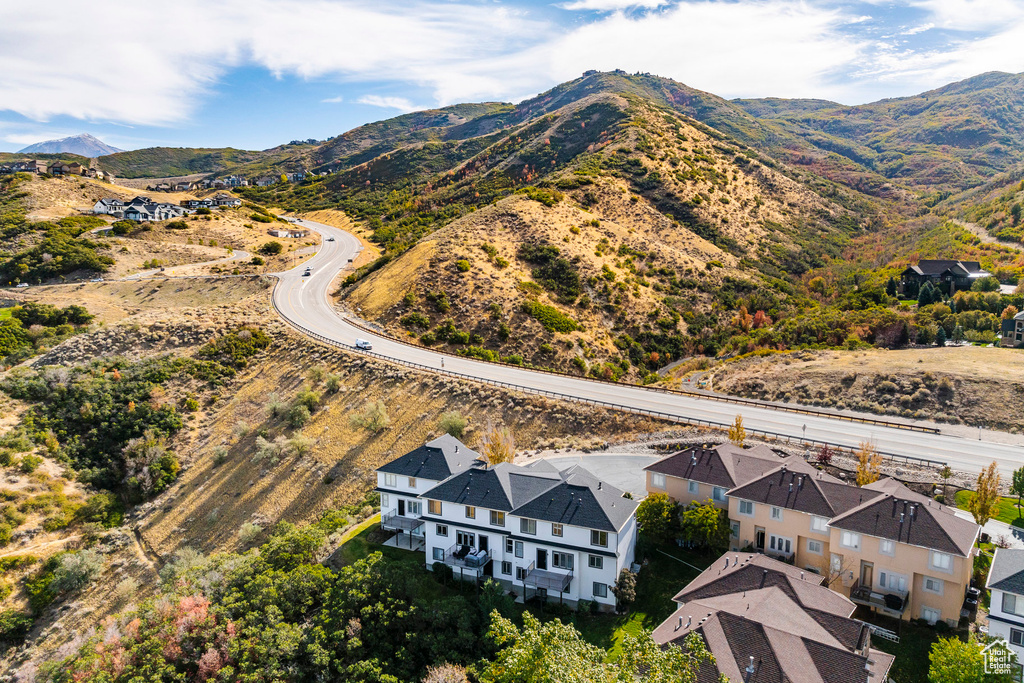 Birds eye view of property with a mountain view