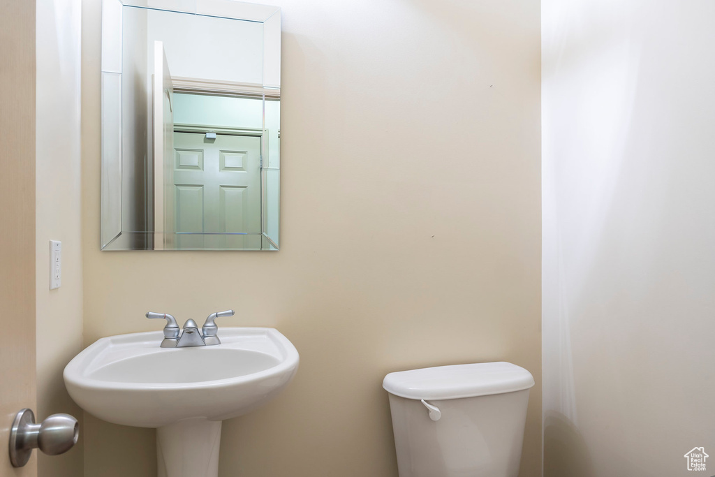 Bathroom featuring toilet and sink