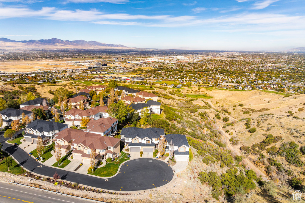 Birds eye view of property with a mountain view