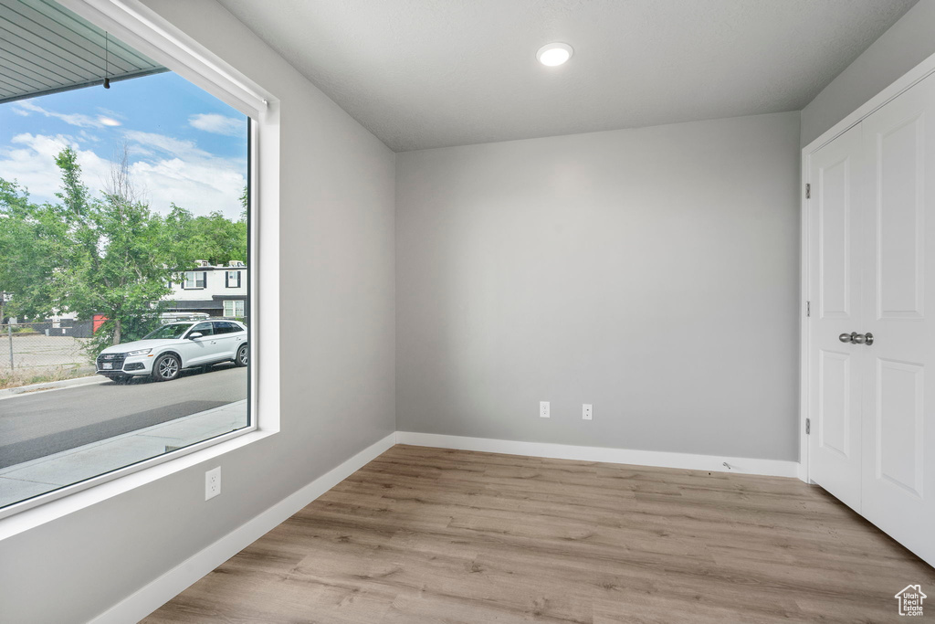 Spare room with light wood-type flooring