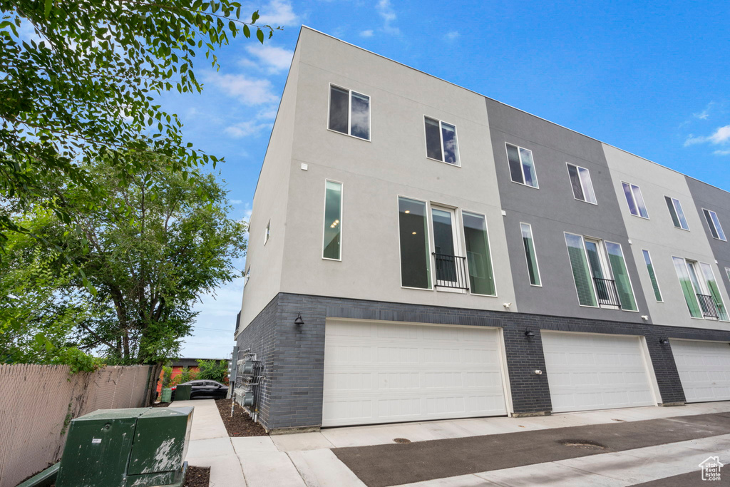 View of front of property with a garage