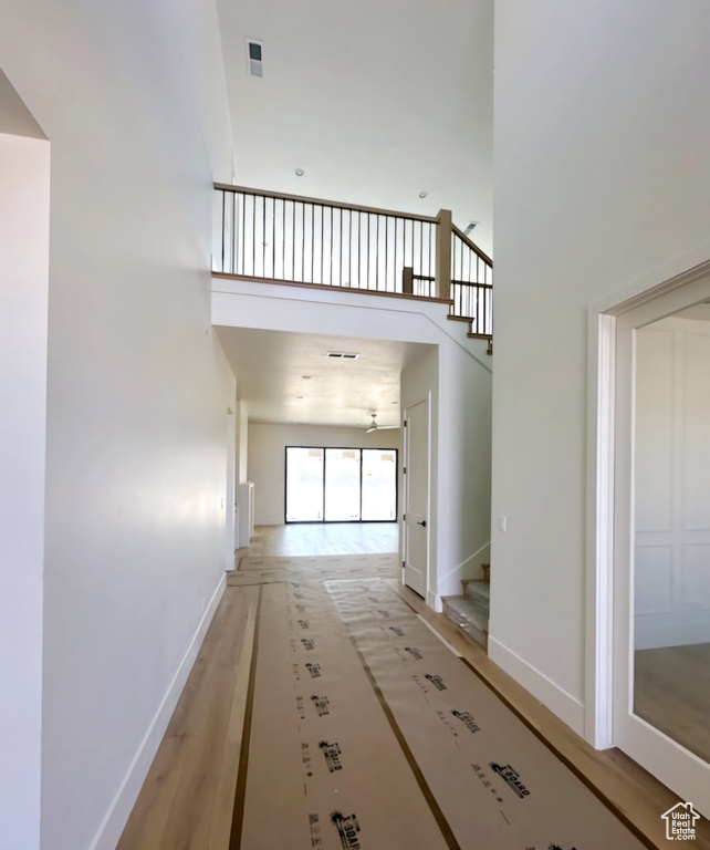 Interior space featuring a towering ceiling