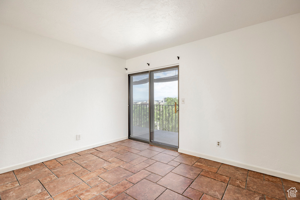 View of tiled spare room