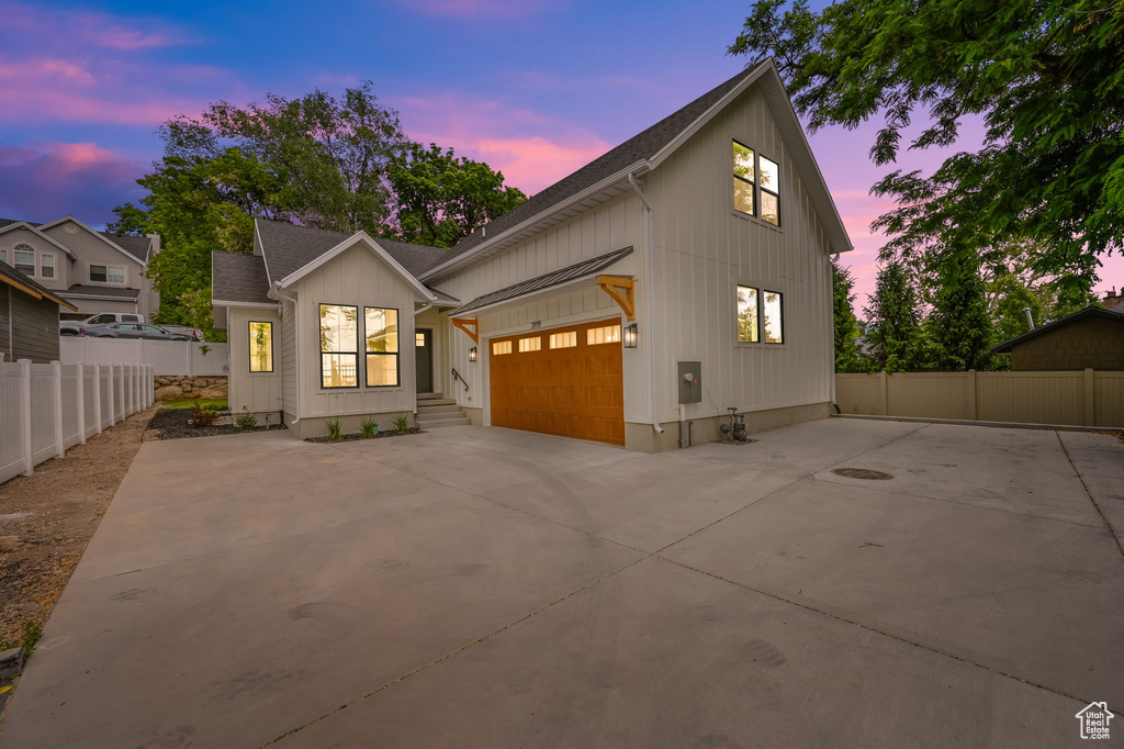 Modern farmhouse style home with a garage