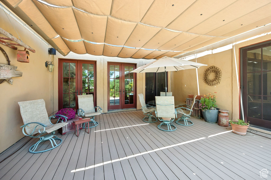 Wooden terrace with french doors