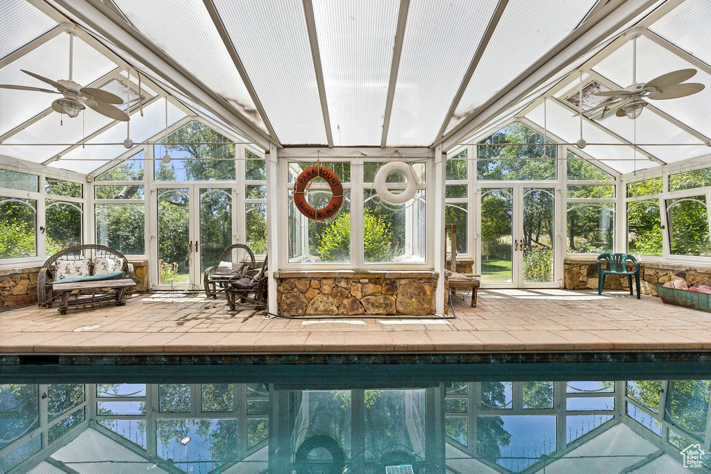 View of pool featuring ceiling fan