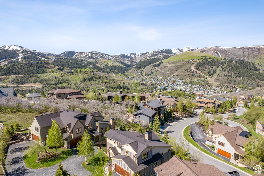 Birds eye view of property with a mountain view