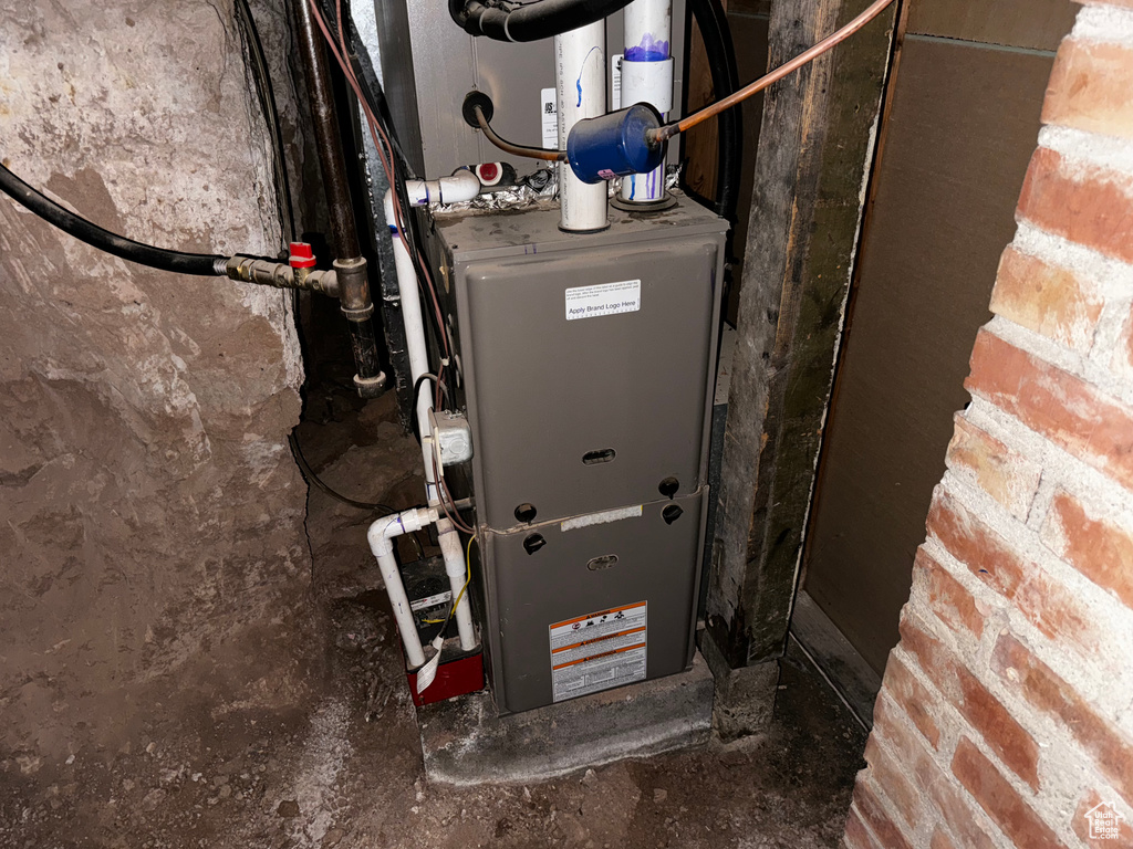 Utility room featuring heating utilities