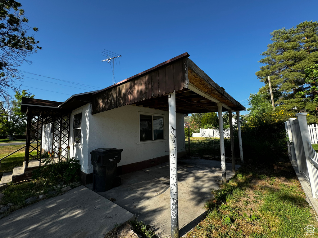 Exterior space with a carport