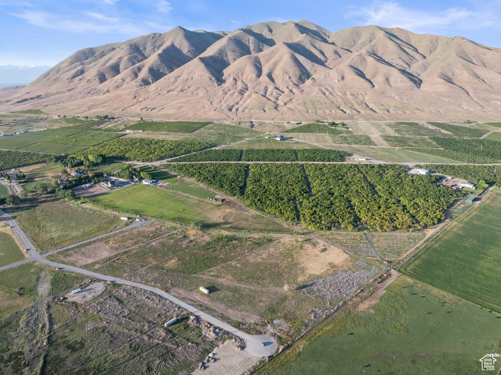 Property view of mountains with a rural view