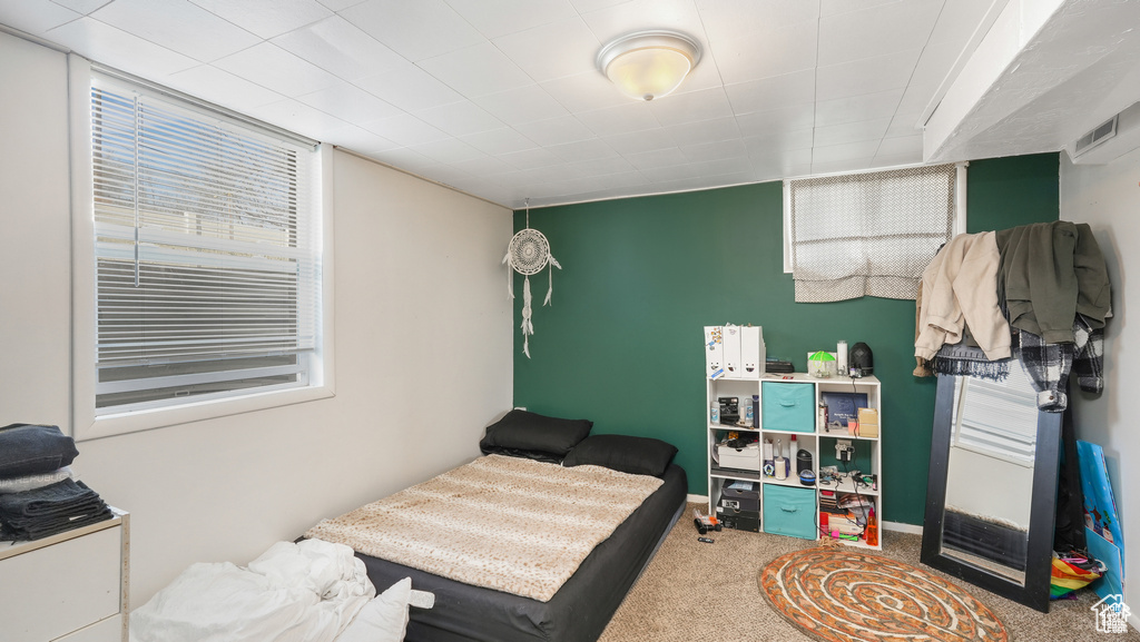 Bedroom featuring carpet flooring