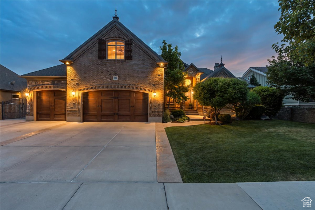 View of front of home with a lawn