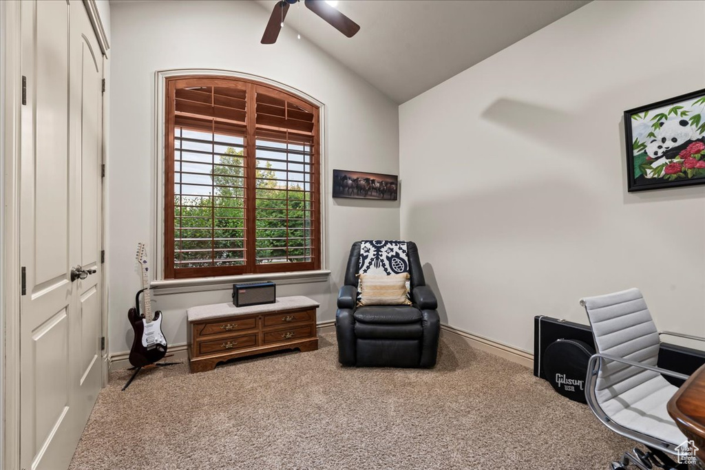 Sitting room featuring carpet flooring, lofted ceiling, and ceiling fan