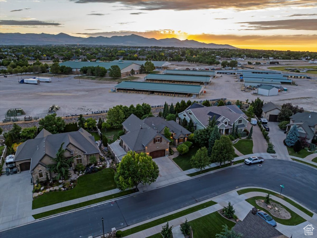 Aerial view at dusk featuring a mountain view