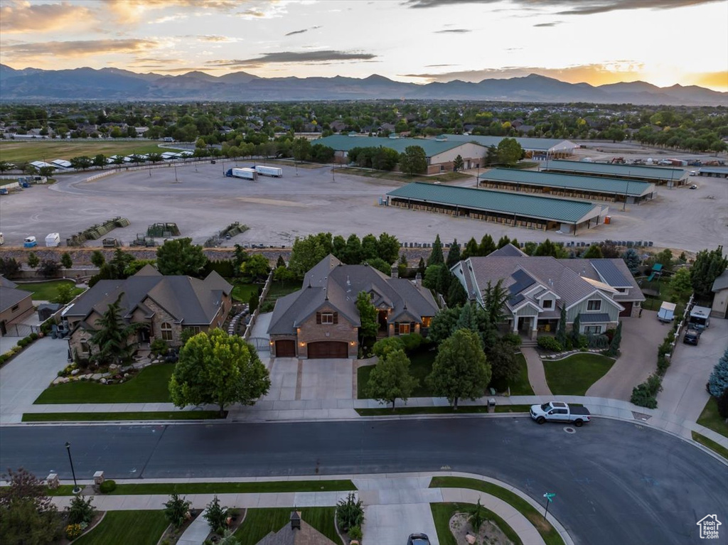 Aerial view at dusk featuring a mountain view