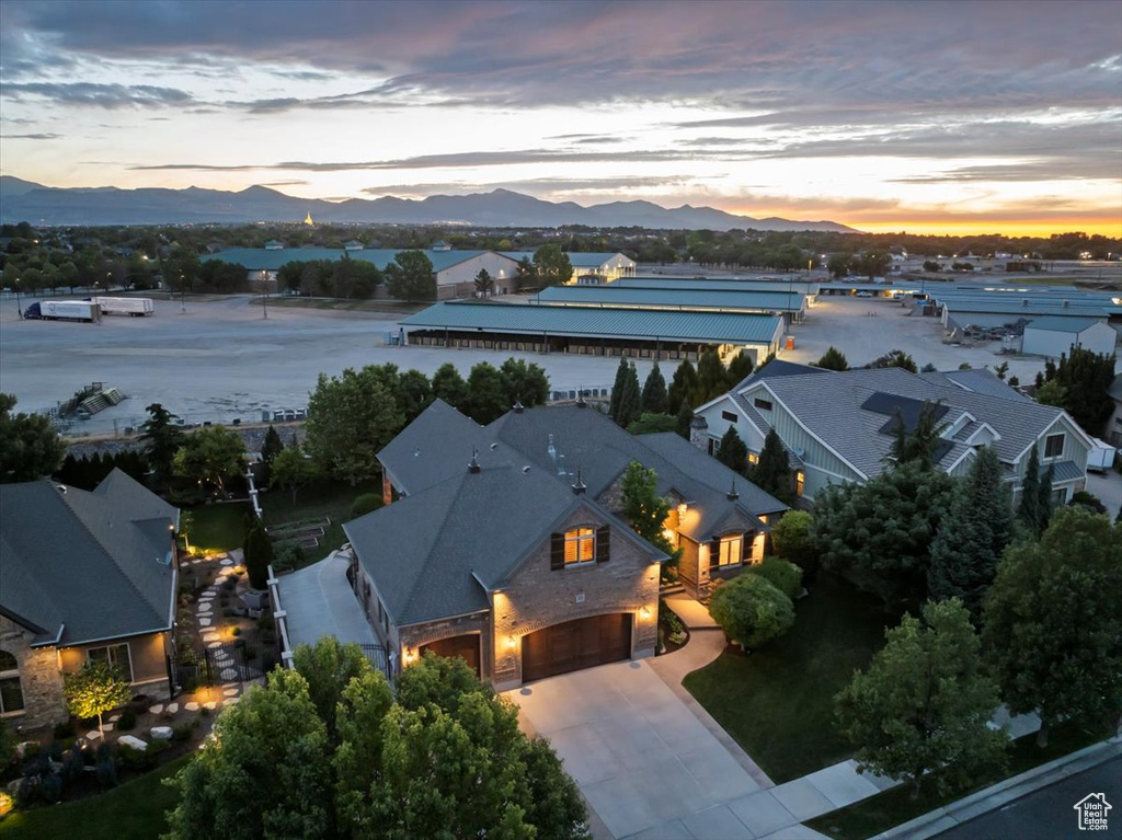 Aerial view at dusk featuring a mountain view