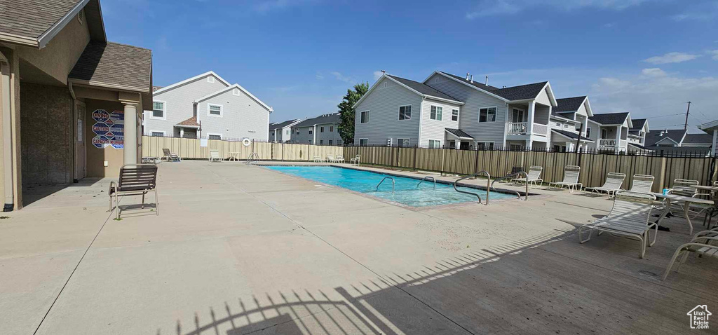 View of swimming pool featuring a patio