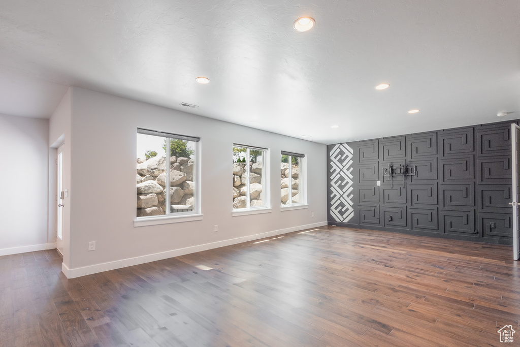 Interior space featuring dark hardwood / wood-style floors