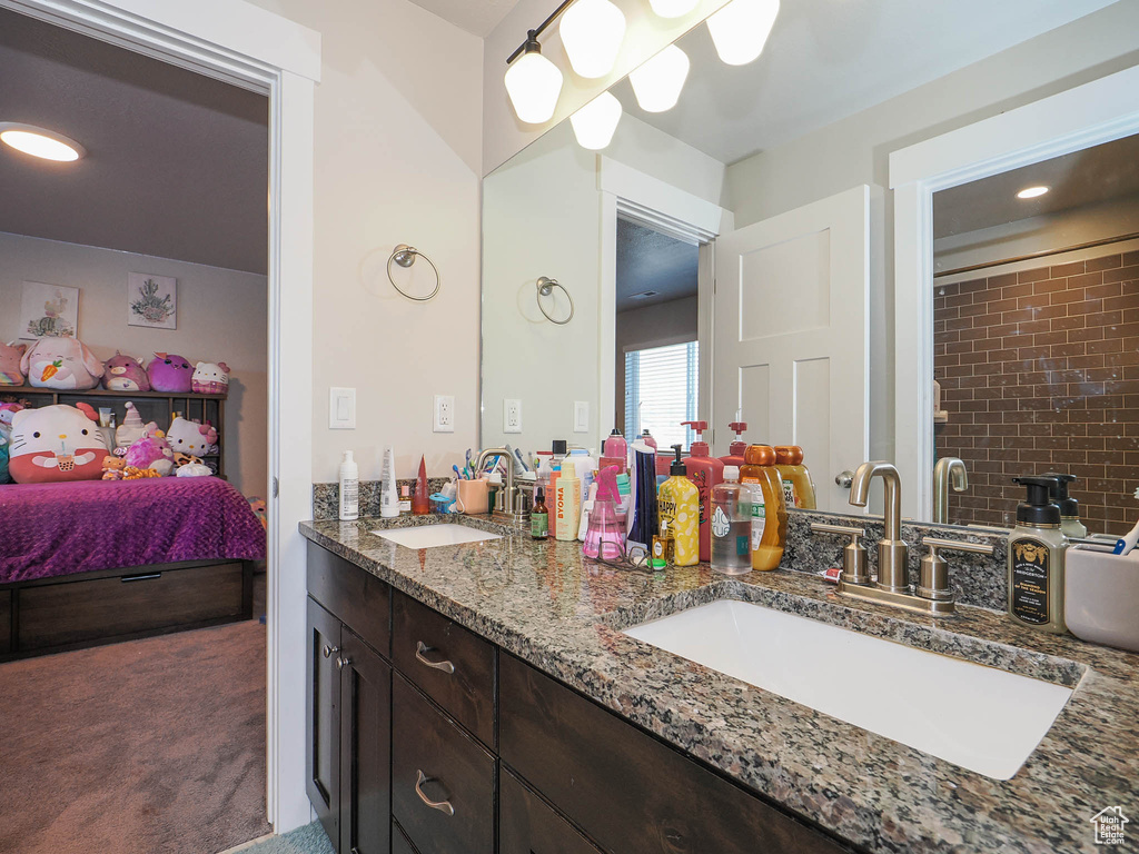 Bathroom featuring dual vanity