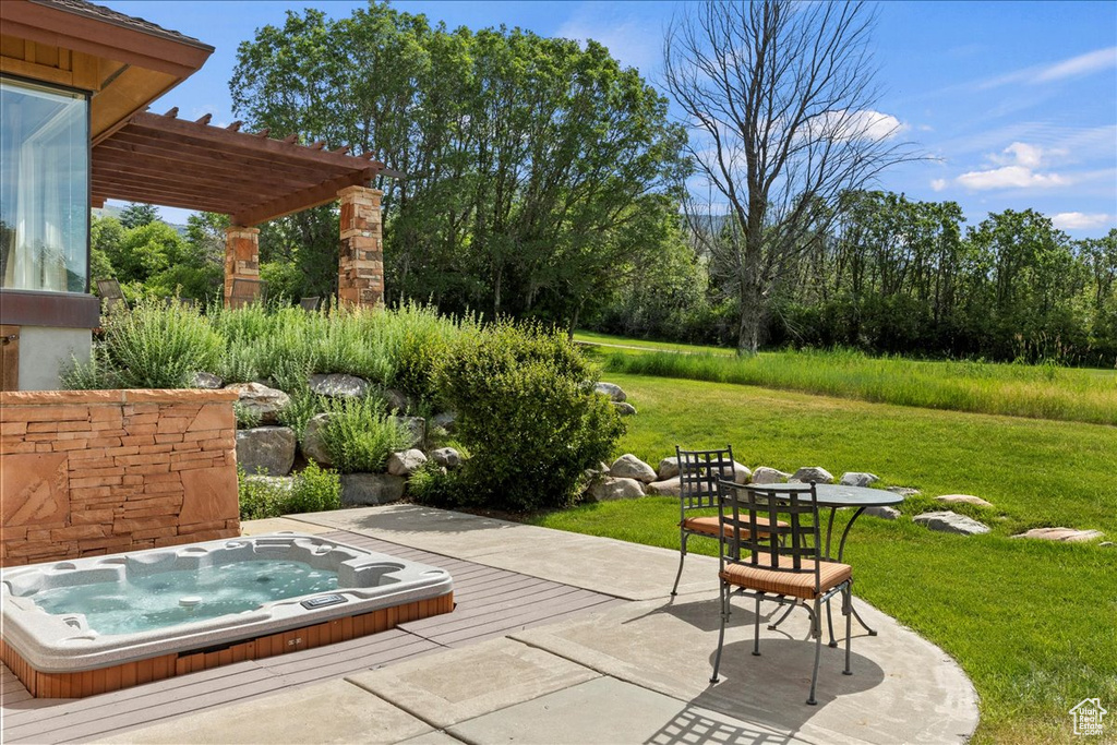 View of patio with a pergola