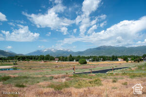 Property view of mountains featuring a rural view