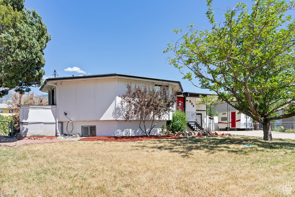 View of front of home with a front yard