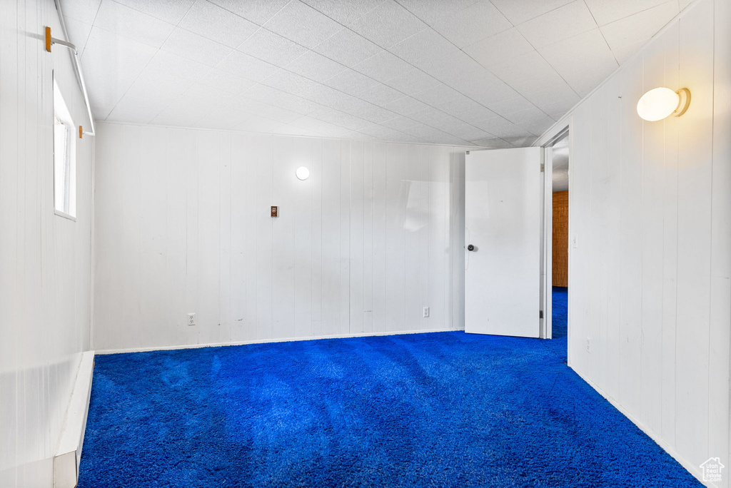 Unfurnished room featuring carpet flooring