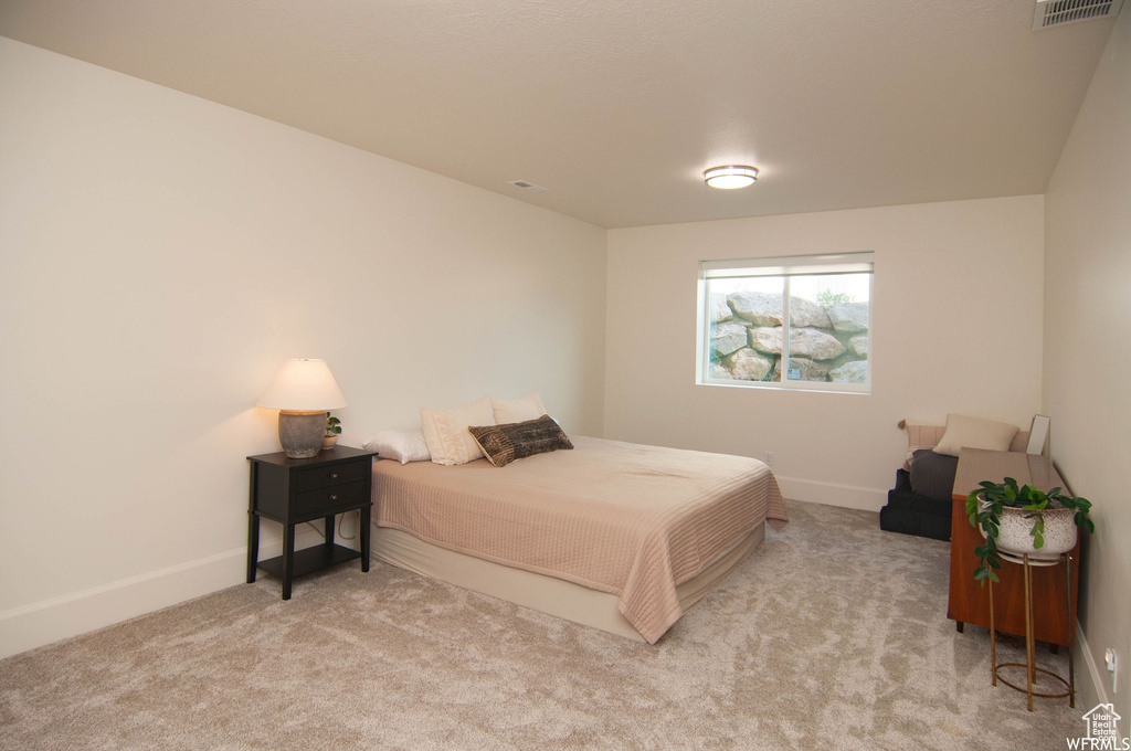 View of carpeted bedroom