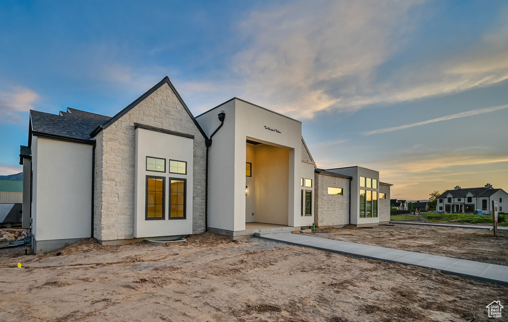 Contemporary house with stone siding
