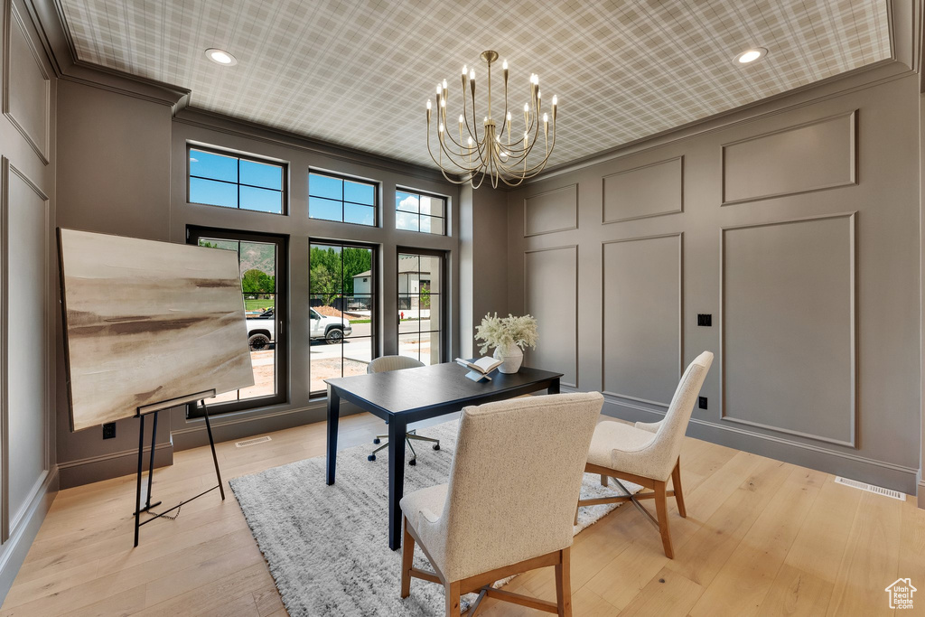 Office with a decorative wall, a chandelier, recessed lighting, ornamental molding, and light wood finished floors